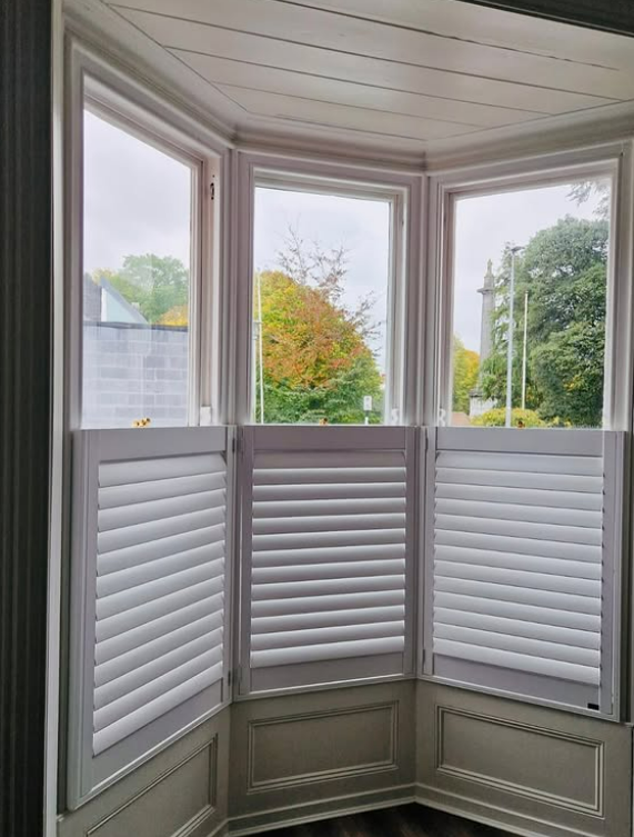 plantation shutters on a bay window